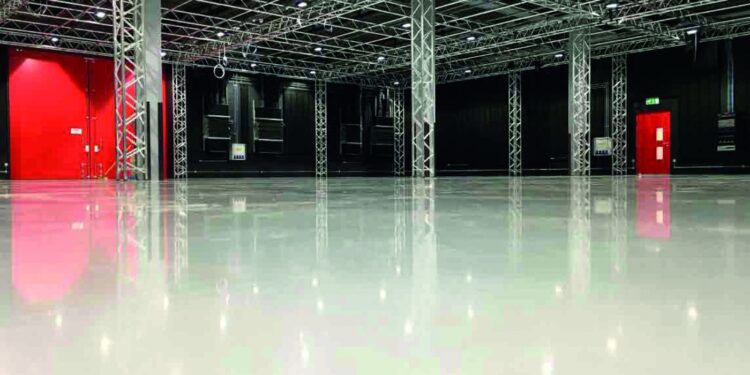 For durability, hygiene and slip-resistance, it has to be resin flooring